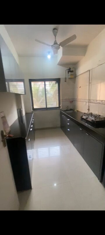 Kitchen in 2 BHK Apartment at K Raheja Palm Court, Malad West – for Rent