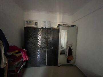 Living Room in 1 BHK Apartment at 5P Manohar Shreeji Nirvana Phase I, Katrap – for Sale