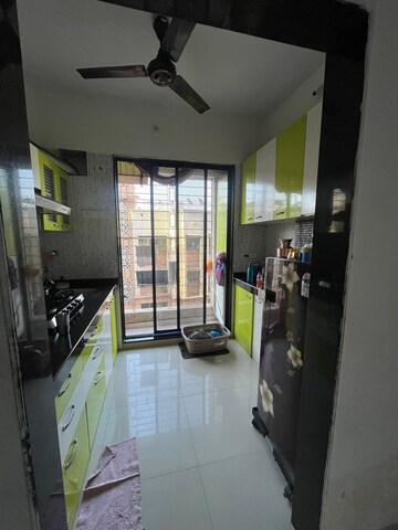Kitchen in 1 BHK Apartment at 5P Manohar Shreeji Nirvana Phase I, Katrap – for Sale