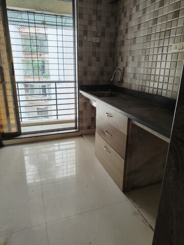 Kitchen in 2 BHK Apartment at Aristo Usha Heights, Kharghar – for Rent