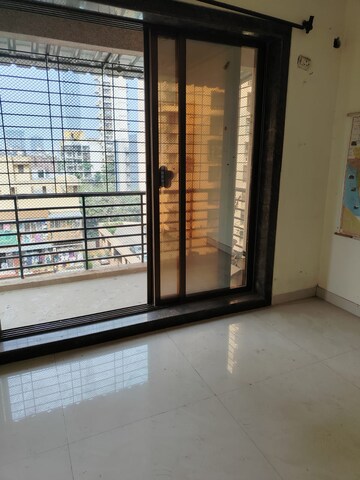 Bedroom in 2 BHK Apartment at Aristo Usha Heights, Kharghar – for Rent