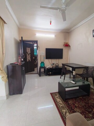 Living Room in 1 BHK Apartment at Royal Palms, Goregaon East – for Rent