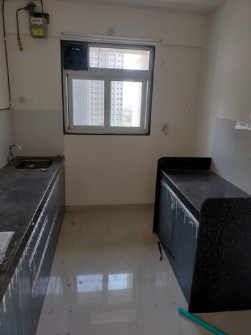 Living Room in 2 BHK Apartment at Ashar Axis, Majiwada – for Sale