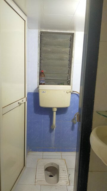 Bathroom in 1 BHK Apartment at Kirtida CHS, Bhandup East – for Rent