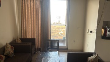 Living Room in 2.5 BHK Apartment at Microtek Greenburg, Sector 86 – for Rent