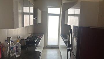 Kitchen in 2.5 BHK Apartment at Microtek Greenburg, Sector 86 – for Rent