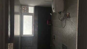 Bathroom in 2.5 BHK Apartment at Microtek Greenburg, Sector 86 – for Rent