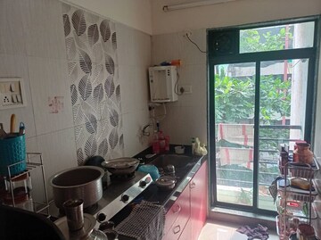 Kitchen in 1 BHK Apartment at Shubh Laxmi Laxmi Paradise, Kharghar – for Sale