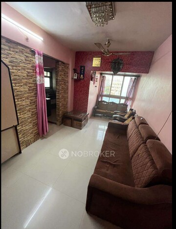 Living Room in 1 BHK Apartment at Vakratunda Towers, Kharghar – for Sale