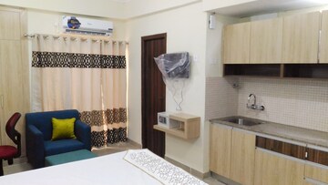 Living Room in Studio Apartment at Supertech Ecociti, Sector 137 – for Rent