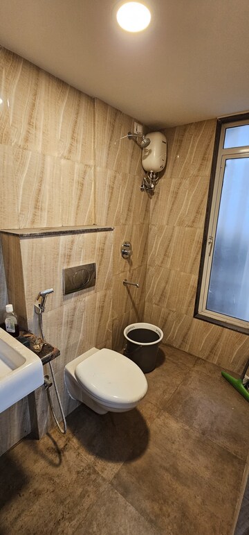 Bathroom in 1 BHK Apartment at Lodha Amara, Kolshet Road – for Rent