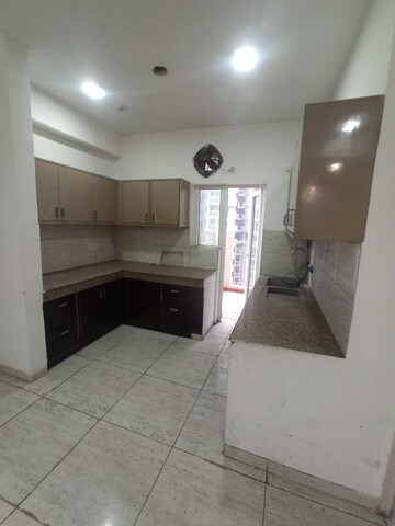Kitchen in 3 BHK Apartment at Ajnara Ambrosia, Sector 118 – for Rent
