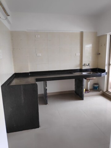 Kitchen in 3 BHK Apartment at Kolte Patil Elburz Hills & Dales , Nibm – for Rent