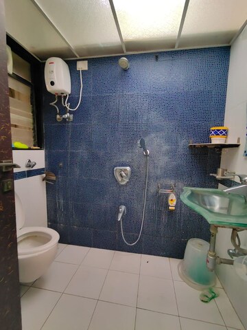 Bathroom in 2 BHK Apartment at Vile Parle West – for Rent