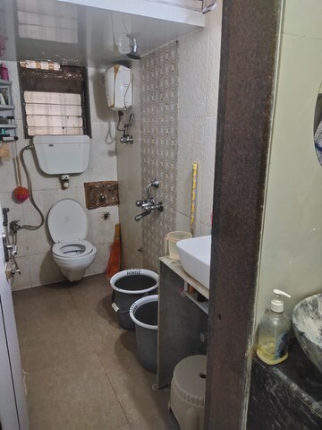 Bathroom in 1 BHK Apartment at Ravi Gaurav Excellency, Mira Road – for Sale