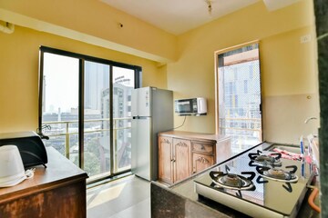 Kitchen in 3 BHK Apartment at Lokhandwala Harmony, Worli – for Rent