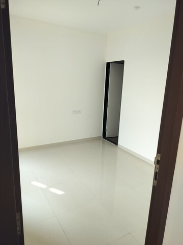 Master Bedroom in 1 BHK Apartment at Chandak Nishchay Wing B, Borivali East – for Sale