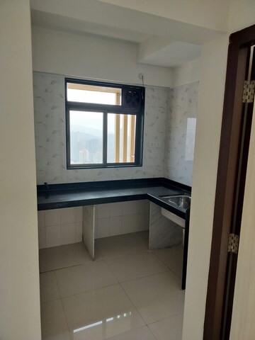 Kitchen in 1 BHK Apartment at Chandak Nishchay Wing B, Borivali East – for Sale