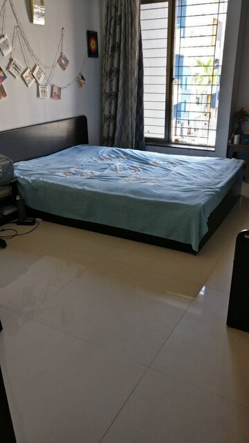 Bedroom in 2 BHK Apartment at Tuljai CHS, Kharadi – for Rent