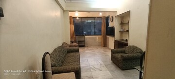 Living Room in 1 BHK Apartment at Lodha World One, Worli – for Rent