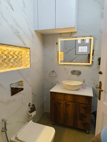 Bathroom in 4 BHK Apartment at Geetanjali Enclave – for Rent