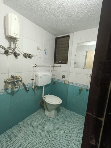Bathroom in 2 BHK Apartment at Rajeshwar Shiv Darshan, Mira Road – for Rent
