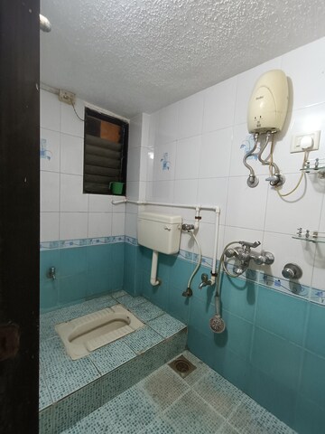 Bathroom in 2 BHK Apartment at Rajeshwar Shiv Darshan, Mira Road – for Rent