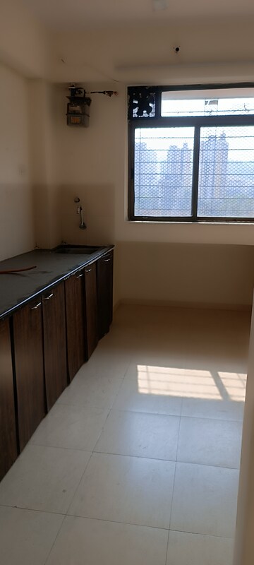 Kitchen in 2 BHK Apartment at Vijay Vatika, Kavesar – for Rent