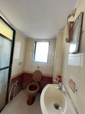 Bathroom in 2 BHK Apartment at Prakruti Park, Brahmand – for Sale