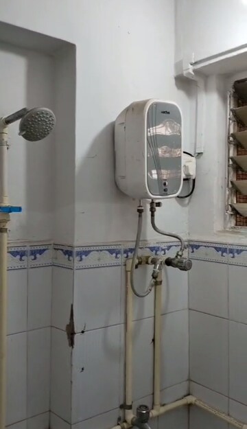 Bathroom in 1 RK Apartment at Rustomjee Natraj, Andheri East – for Rent