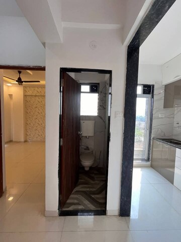 Building Lobby in 1 BHK Apartment at Yash Platinum, Kharghar – for Rent