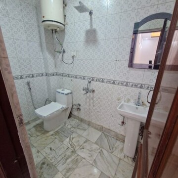 Bathroom in 1 BHK Builder Floor at Khirki Extension – for Sale