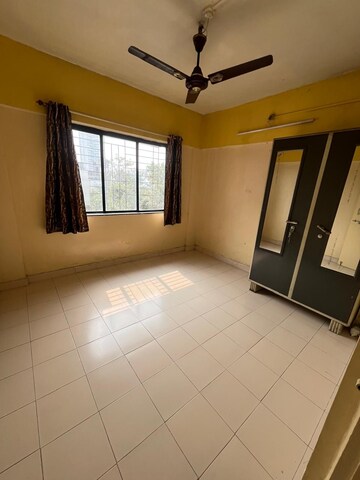 Room in 2 BHK Apartment at Kailash CHS, Kothrud – for Rent