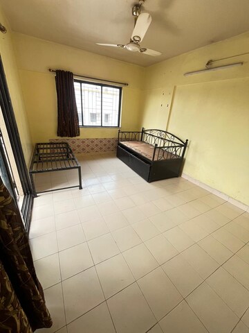 Kitchen in 2 BHK Apartment at Kailash CHS, Kothrud – for Rent