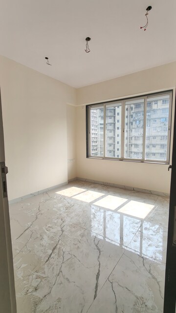 Room in 2 BHK Apartment at Tattva Mittal Cove, Andheri West – for Sale