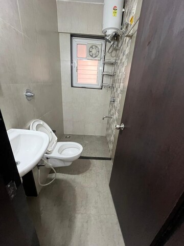 Bathroom in 3 BHK Apartment at Ranjeet Heights CHS, Kothrud – for Rent