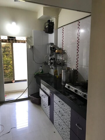 Kitchen in 2 BHK Apartment at Cosmos County II, Ghodbunder Road – for Rent