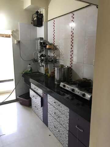 Kitchen in 2 BHK Apartment at Cosmos County II, Ghodbunder Road – for Rent