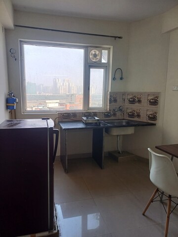 Master Bedroom in 1 BHK Apartment at Urbtech Xaviers, Sector 168 – for Rent