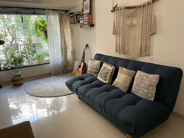 Living Room in 2 BHK Apartment at Rishabraj Blue Lotus, Khar West – for Sale