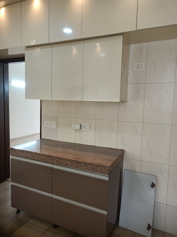 Kitchen in 4 BHK Apartment at 3C Lotus Panache, Sector 110 – for Rent