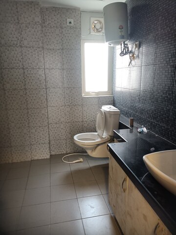 Bathroom in 4 BHK Apartment at 3C Lotus Panache, Sector 110 – for Rent