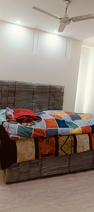 Bedroom in 3.5 BHK Builder Floor at Panchsheel Enclave – for Rent