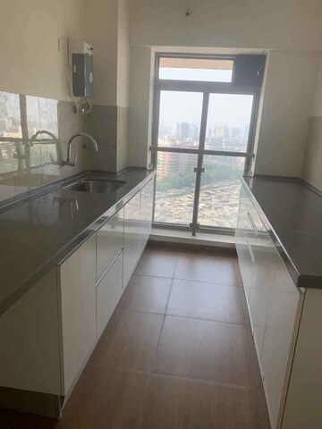 Kitchen in 1 BHK Apartment at Sunteck West World, Naigaon East – for Rent
