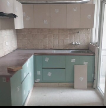 Kitchen in 3 BHK Apartment at Amrapali Golf Homes, Sector 4, Greater Noida – for Rent