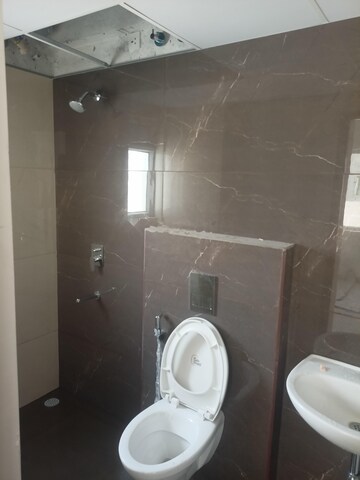 Bathroom in 3 BHK Apartment at Ambience Courtyard, Manikonda – for Rent