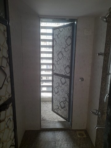 Bathroom in 1 BHK Apartment at Om Sai Jai Guruji Tower, Kalyan West – for Sale