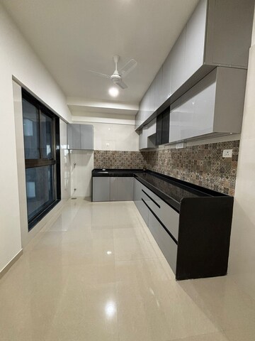 Kitchen in 4 BHK Apartment at Rajesh Raj Infinia, Malad West – for Rent
