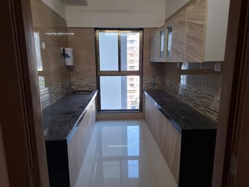 Kitchen in 2 BHK Apartment at Omkar Signet, Malad East – for Rent