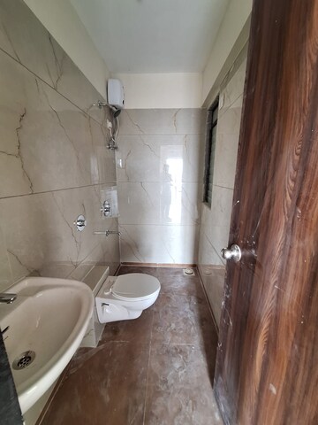 Bathroom in 2 BHK Apartment at Raunak City, Kalyan West – for Rent